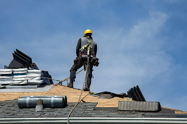 Professional Roofing technician working in Iowa City, IA